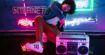 person break dancing by a radio