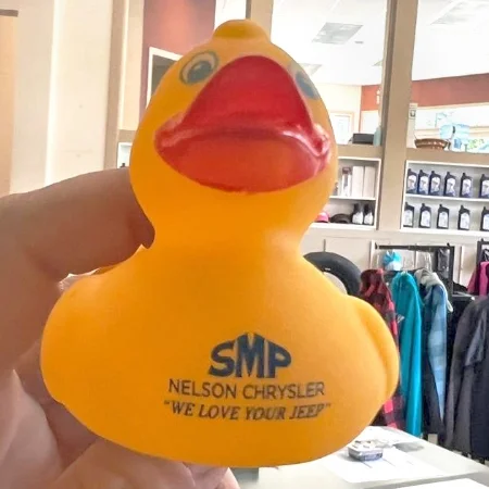 A rubber duck with a logo