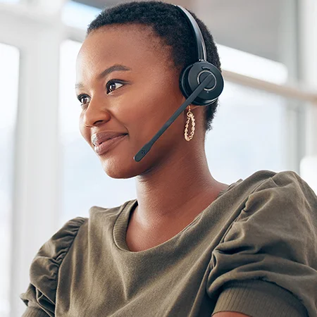 Smiling woman wearing headset