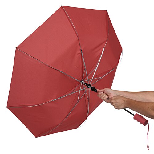 Additional Image 4 - a hand holding a red umbrella