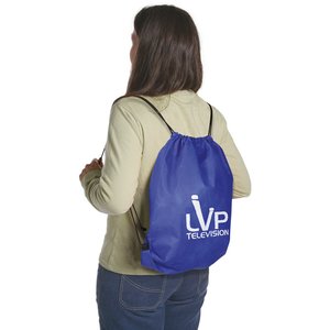 Additional Image 2 - a woman wearing a blue backpack