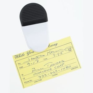 Additional Image 1 - a black and white object on a yellow paper