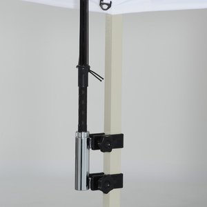 Additional Image 1 - a black and silver object on a white wall