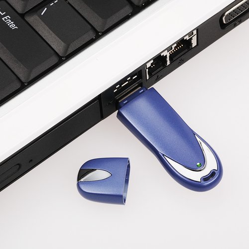Additional Image 1 - a usb flash drive next to a keyboard
