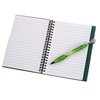 a white notebook with a green ribbon