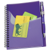 a purple notebook with a pen