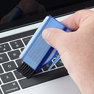Additional Image 2 - a hand holding a blue flash drive on a keyboard