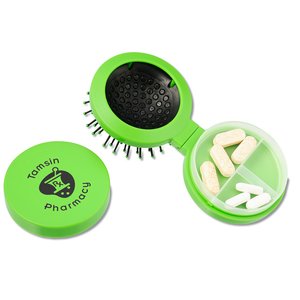 Additional Image 1 - a green brush with a round green handle