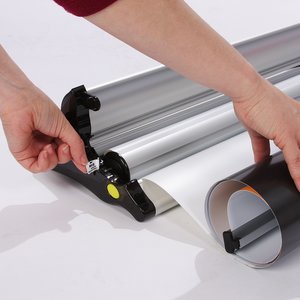 Additional Image 3 - a person holding a roll of paper