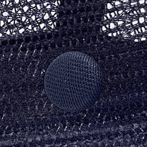 Additional Image 1 - a black circle on a mesh surface