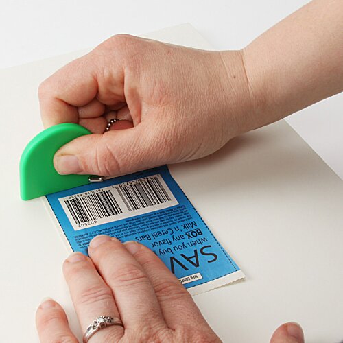 Additional Image 1 - a person's hands holding a small green object