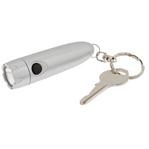 Additional Image 1 - a white flashlight with a key