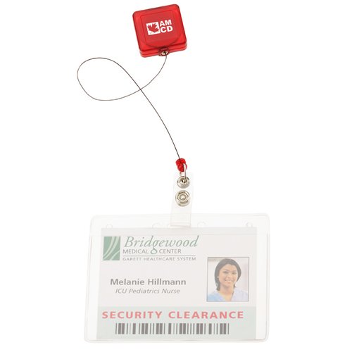 Additional Image 1 - a badge with a red square on it