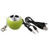 a green round object with black cord