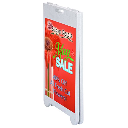 Additional Image 2 - a white sign with a red label
