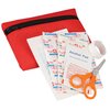 a red bag with scissors and paper