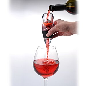 Additional Image 2 - a person pouring red liquid into a glass
