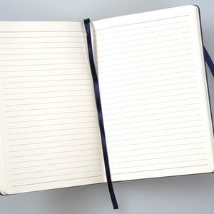Additional Image 1 - a white notebook with a black band