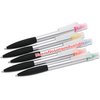 a group of pens on a white background