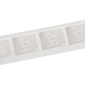 Additional Image 1 - a white rectangular object with square holes