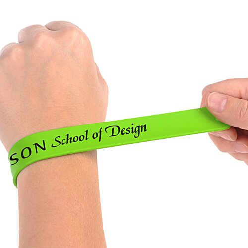 Additional Image 2 - a person's hand holding a green wristband