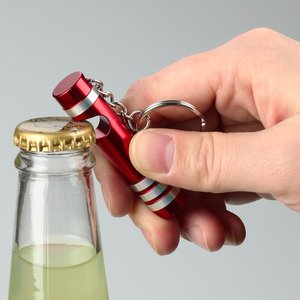 Additional Image 2 - a hand opening a bottle of beer