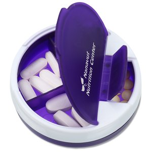 Additional Image 1 - a round container with a blue box with a purple lid