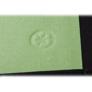 Additional Image 2 - a close up of a green paper
