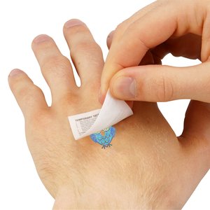 Additional Image 2 - a person putting a bandage on a hand