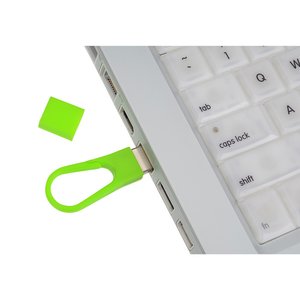 Additional Image 2 - a green sticker sticking out of a keyboard