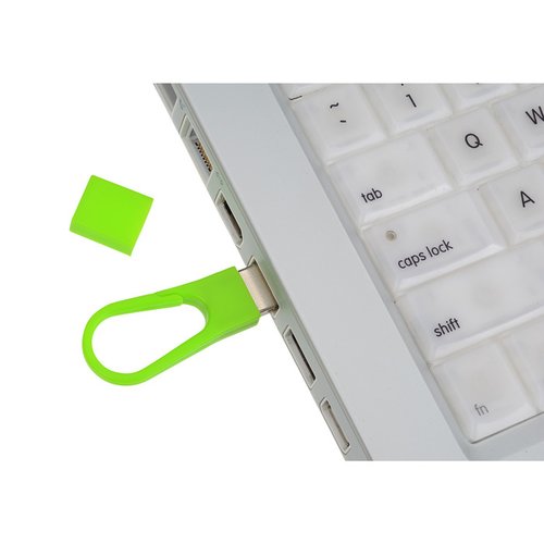 Additional Image 2 - a green sticker sticking out of a keyboard