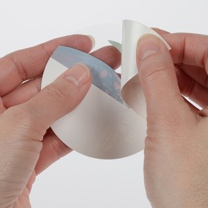 Additional Image 1 - a person holding a white object