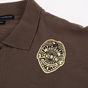 Additional Image 2 - a brown shirt with a gold badge on it