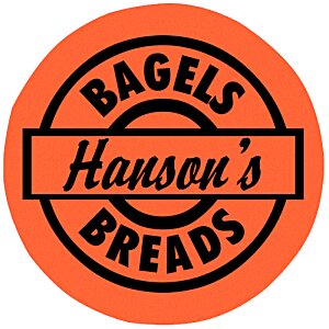 Additional Image 1 - a round orange label with black text