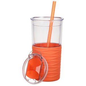 Additional Image 1 - a glass with orange liquid and a straw