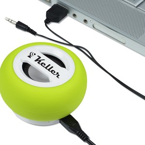 Additional Image 3 - a green ball with a white border next to a grey laptop