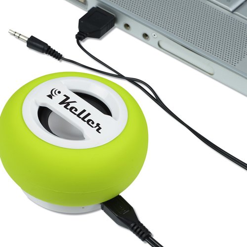 Additional Image 3 - a green ball with a white border next to a grey laptop