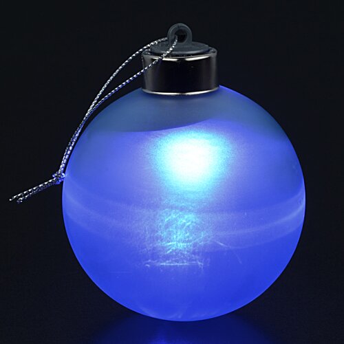 Additional Image 2 - a blue round object with a string