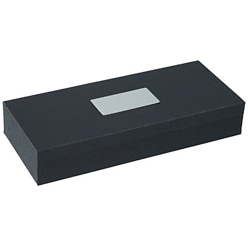 Additional Image 4 - a black rectangular box with a silver label