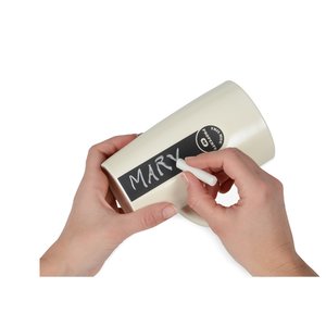 Additional Image 1 - a person holding a pen and a mug