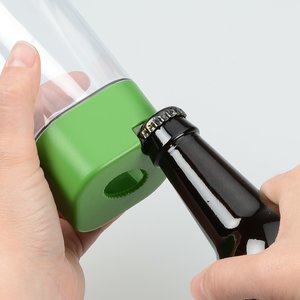 Additional Image 1 - a hand holding a green pencil sharpener