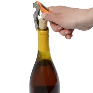 Additional Image 3 - a hand opening a bottle of wine