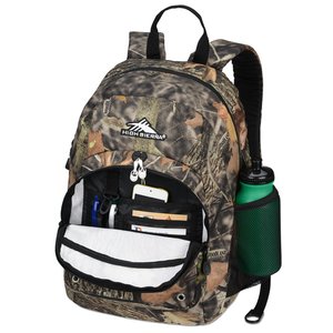 Additional Image 1 - a camouflage backpack with a green and white object