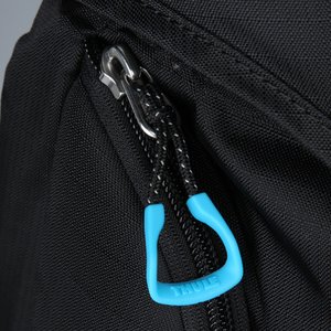 Additional Image 1 - a blue zipper on a black bag