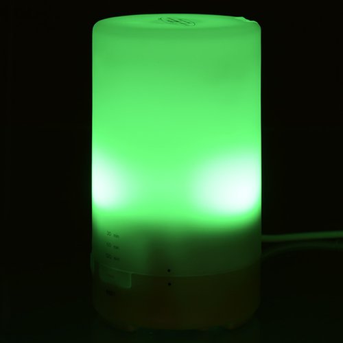 Additional Image 4 - a green candle in the dark