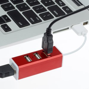 Additional Image 1 - a red rectangular object with a black cord plugged into it