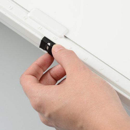 Additional Image 6 - a hand holding a black marker