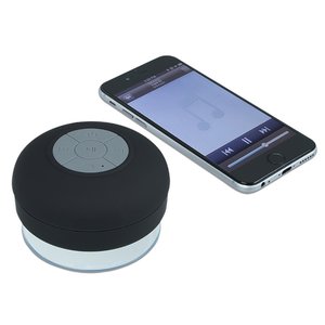Additional Image 2 - a cell phone next to a round object