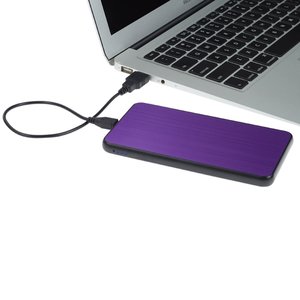 Additional Image 1 - a purple rectangular object next to a laptop