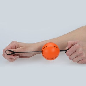Additional Image 1 - a hand holding a ball
